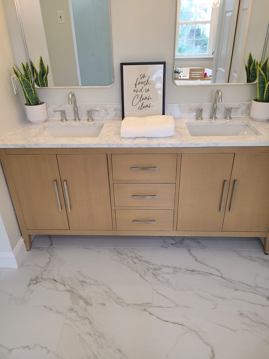 Double vanity with undermount sinks and marble countertop